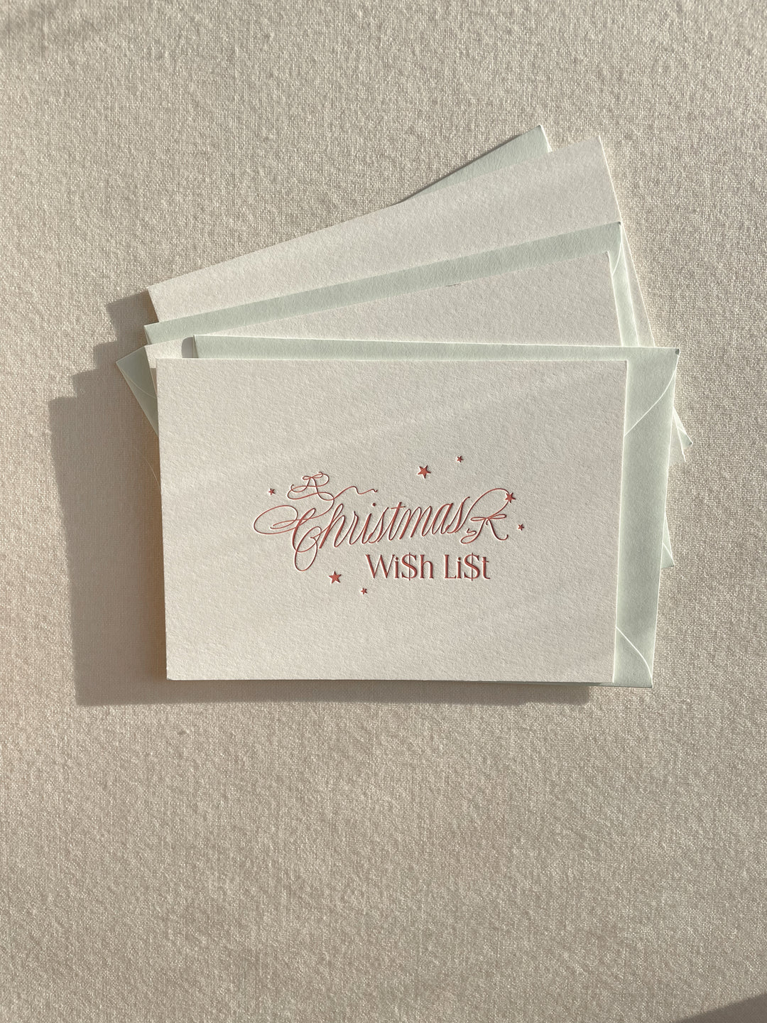 Letterpress holiday Swiftmas cards printed by Ayla Peña of The Ayla View, designed and written in calligraphy by Isabel Dusmann