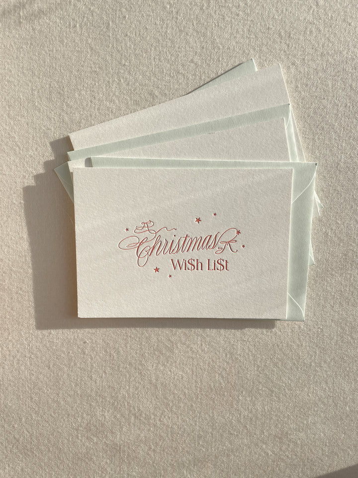 Letterpress holiday Swiftmas cards printed by Ayla Peña of The Ayla View, designed and written in calligraphy by Isabel Dusmann