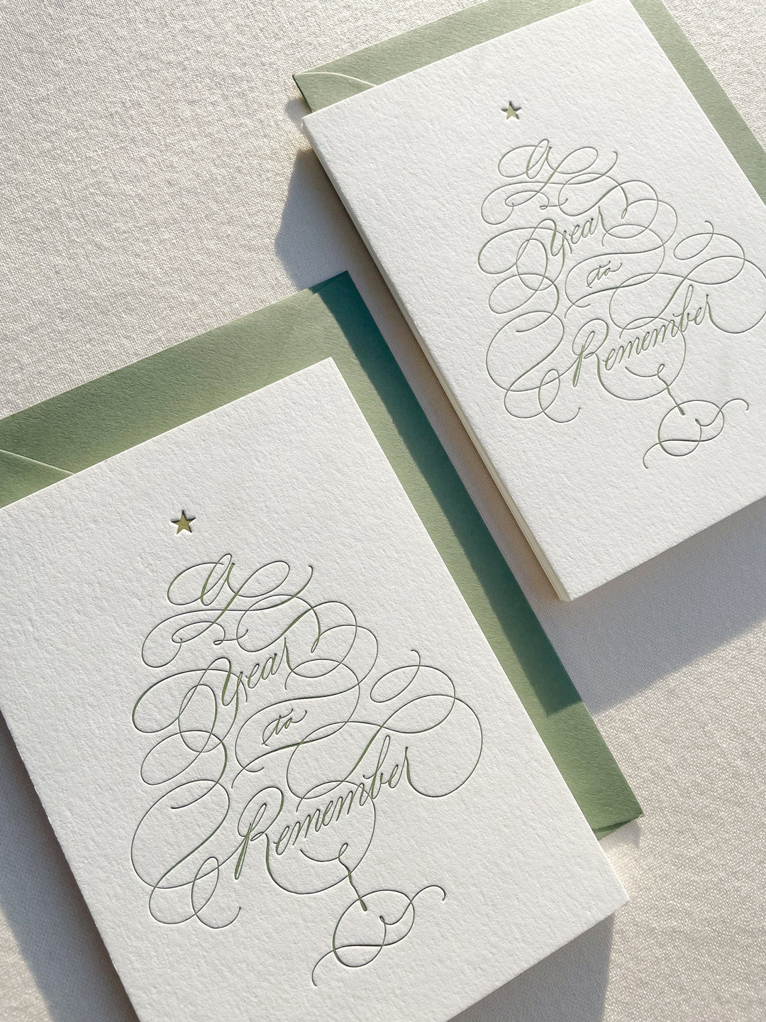 Letterpress holiday cards printed by Ayla Peña of The Ayla View, designed and written in calligraphy by Isabel Dusmann