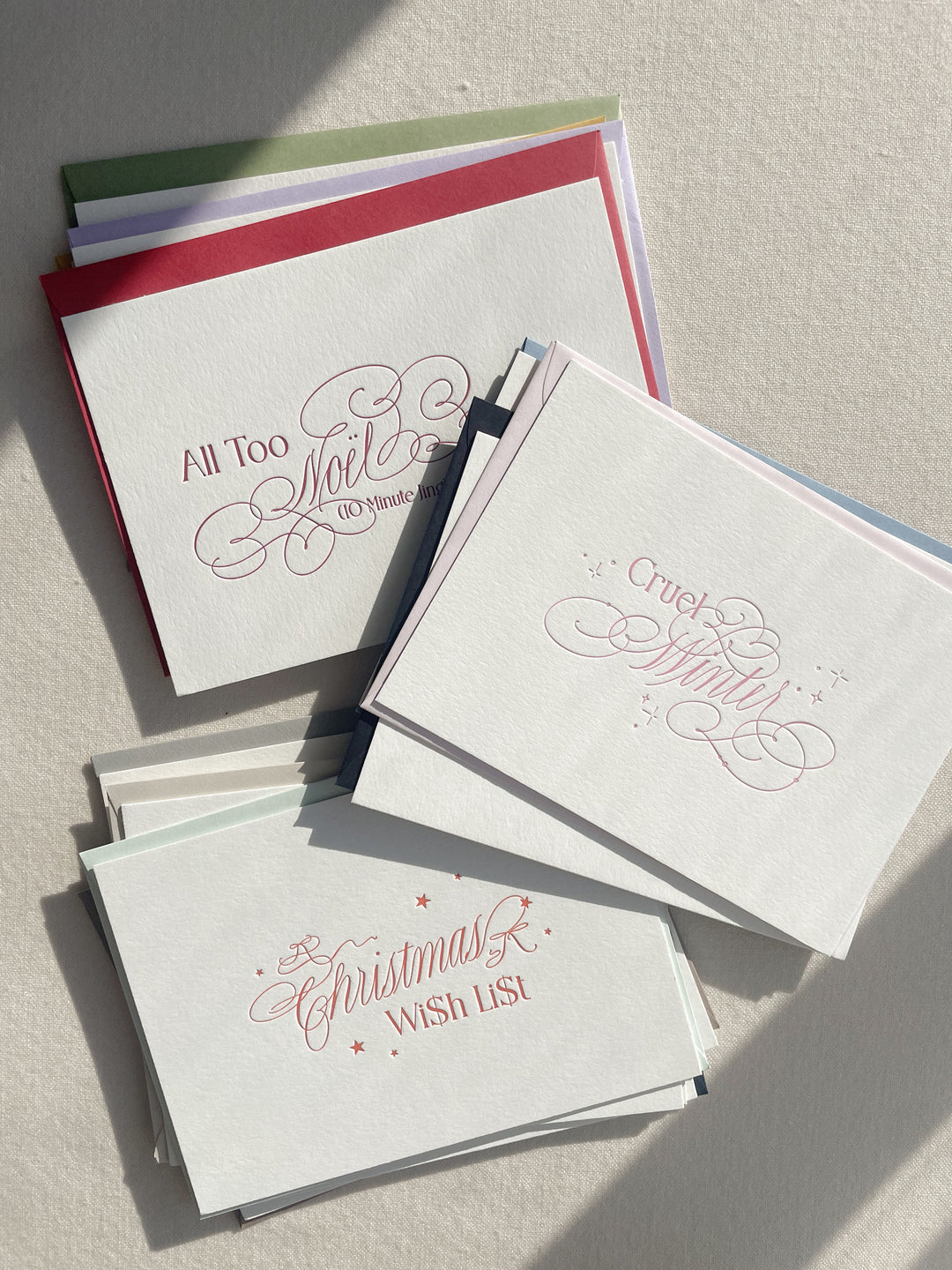 Letterpress holiday Swiftmas cards printed by Ayla Peña of The Ayla View, designed and written in calligraphy by Isabel Dusmann